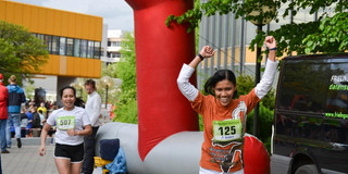 A SPRING student finishing the Campuslauf.