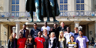 SPRING Students in Front of a statue of German Poets.