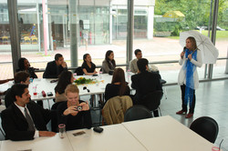 Dr. Anne Weber giving a speech to the students