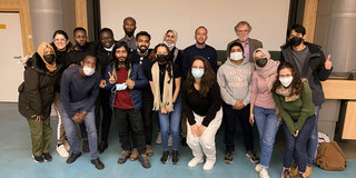 Lecture Prof. Schmidt-Kallert group picture of the audience with Prof. Schmidt-Kallert.