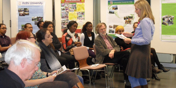 Picture of Dr. Anne Weber giving a presentation during the SPRING opening ceremony