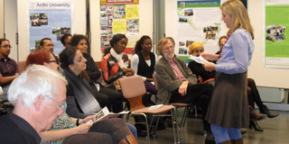 SPRING opening ceremony Picture of Dr. Anne Weber giving a presentation during the SPRING opening ceremony