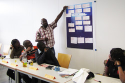 A student giving a presenttion of the newly learned contents