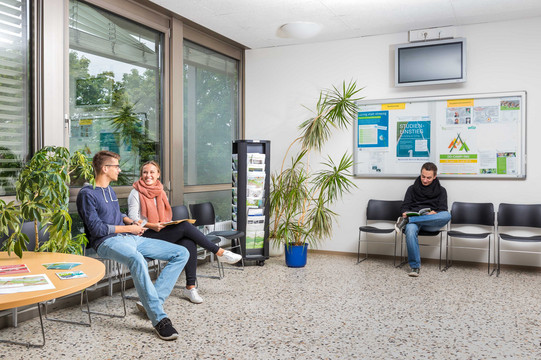 Students sitting in the waiting area of the Central Student Advisory Service